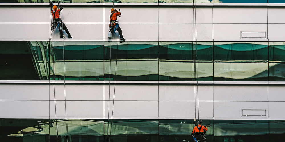 window washers cleaning a skyscraper